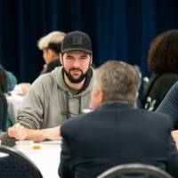 Thompson Scholars sit at a table